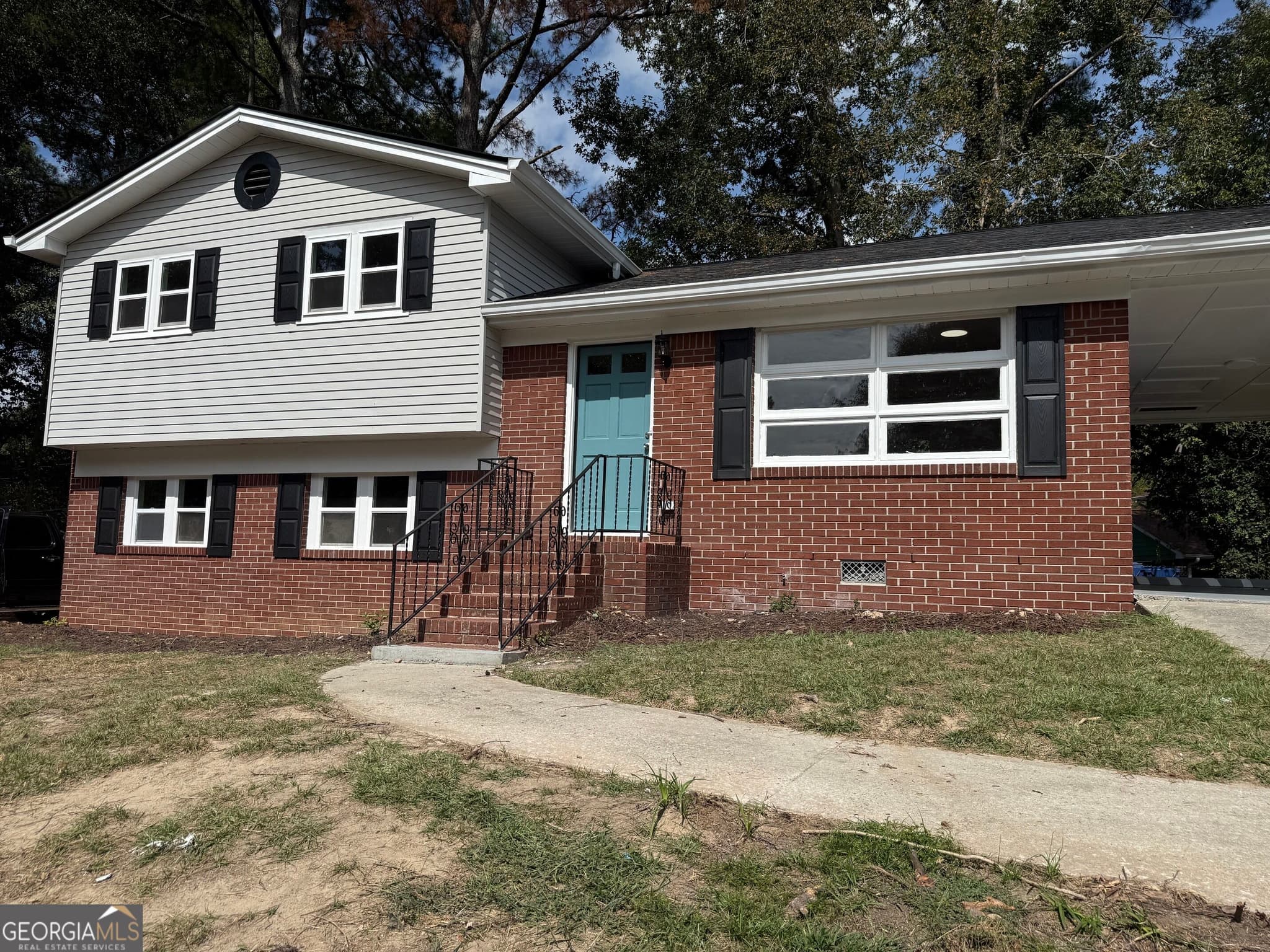 4 bedroom, 2.5 bathroom single family residence for sale at 3229 Vanderbilt Lane, Atlanta, GA 30318 — photo 4
