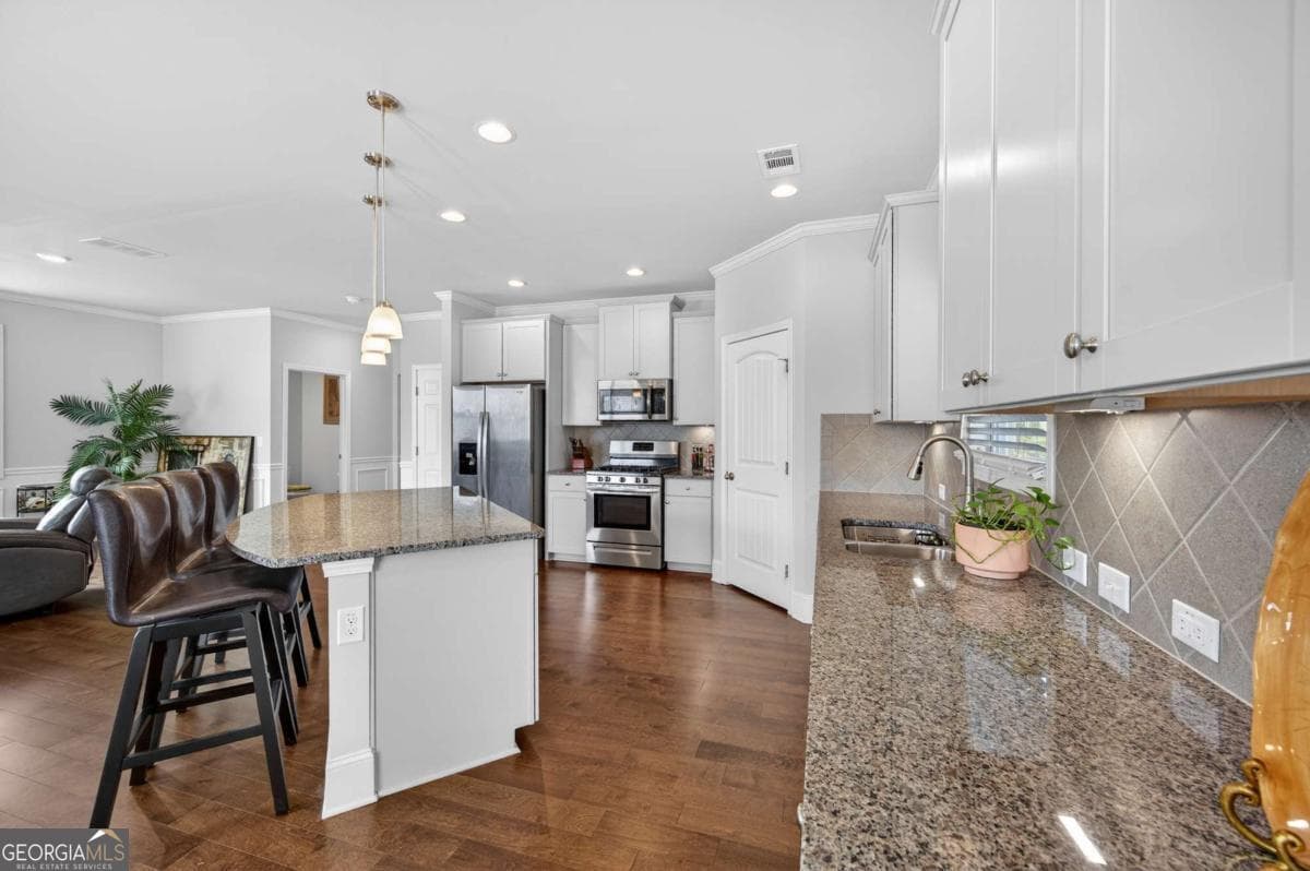 3 bedroom, 2.5 bathroom, 2,250 sq ft single family residence for sale at 6497 Crosscreek Lane, Flowery Branch, GA 30542 — photo 1 of 14