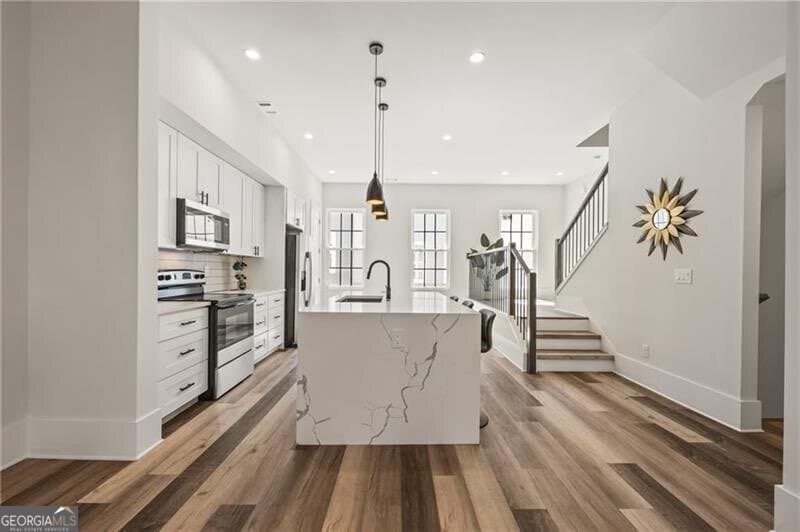 4 bedroom, 3.5 bathroom, 2,200 sq ft townhouse for sale at 3165 Dogwood Drive 104, Hapeville, GA 30354 — photo 4