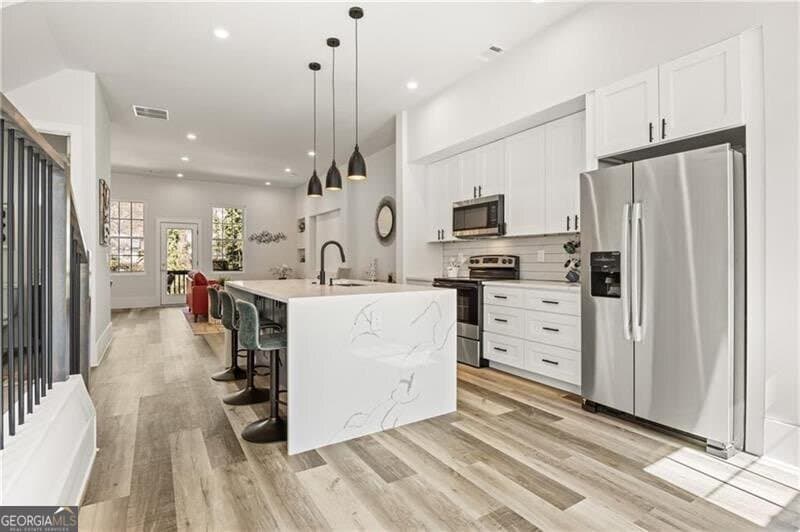 4 bedroom, 3.5 bathroom, 2,200 sq ft townhouse for sale at 3165 Dogwood Drive 104, Hapeville, GA 30354 — photo 8