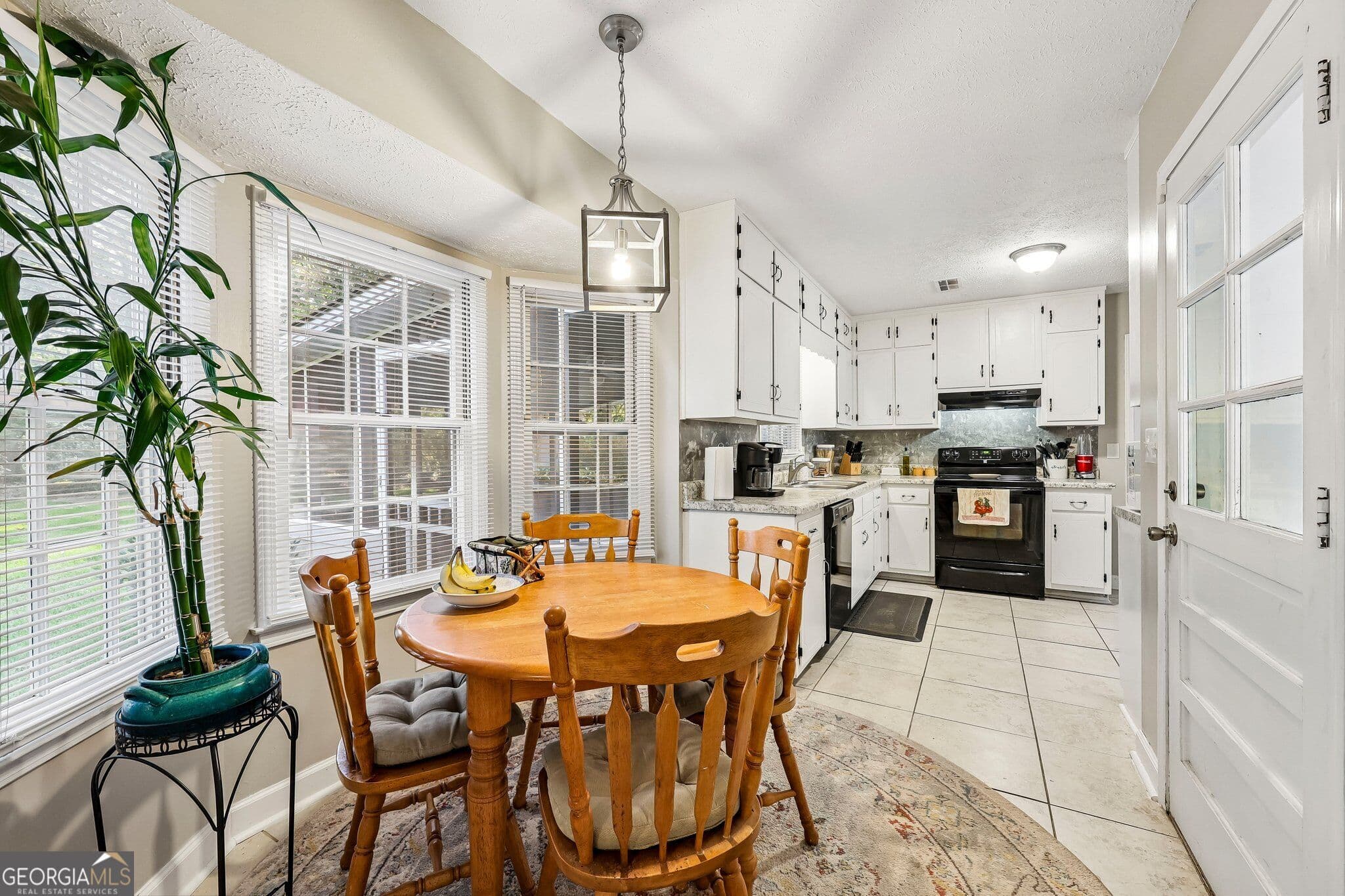 3 bedroom, 2 bathroom, 1,519 sq ft single family residence for sale at 3256 Village Glen Trail, Snellville, GA 30039 — photo 6