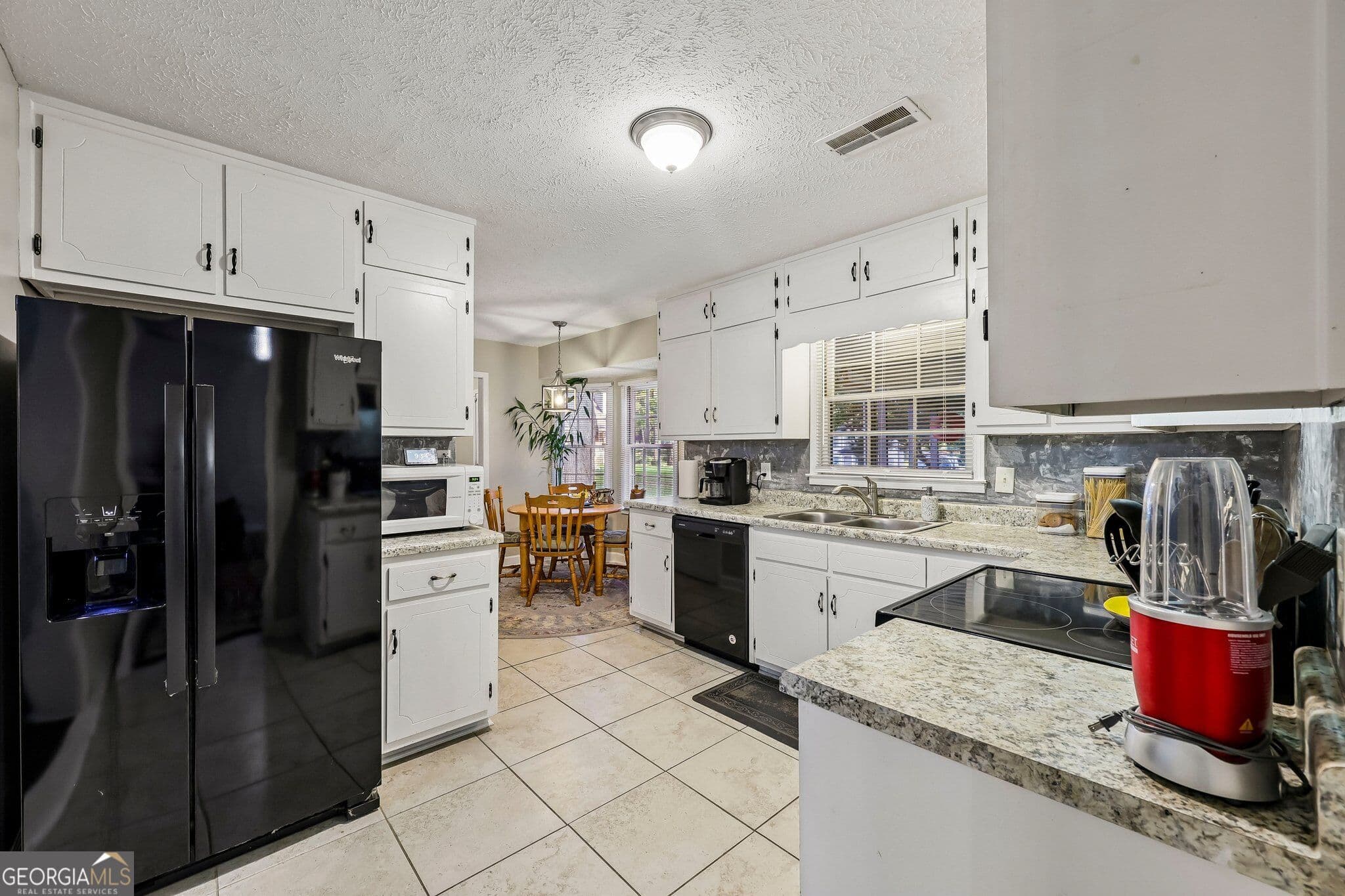 3 bedroom, 2 bathroom, 1,519 sq ft single family residence for sale at 3256 Village Glen Trail, Snellville, GA 30039 — photo 7