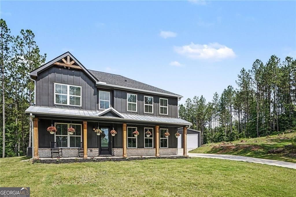 5 bedroom, 3 bathroom, 2,384 sq ft single family residence for sale at 613 Millen Road, Monticello, GA 31064 — photo 1 of 35