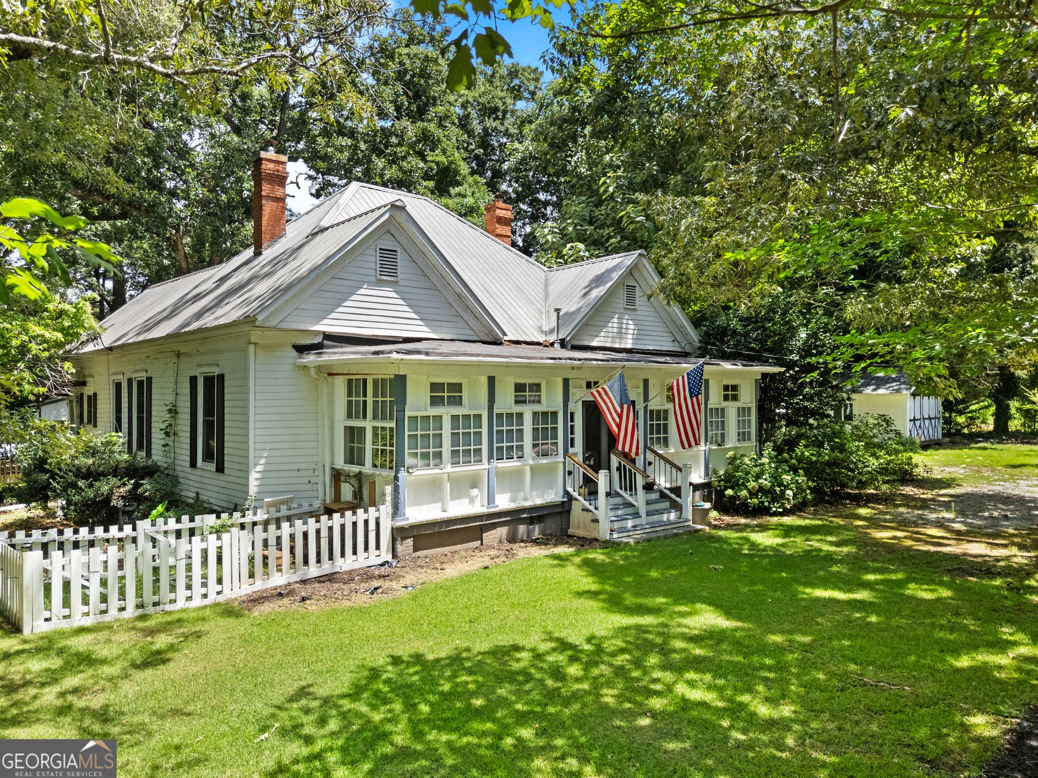 3 bedroom, 2.5 bathroom, 3,133 sq ft single family residence for sale at 107 Sixth Avenue, Mansfield, GA 30055 — photo 2