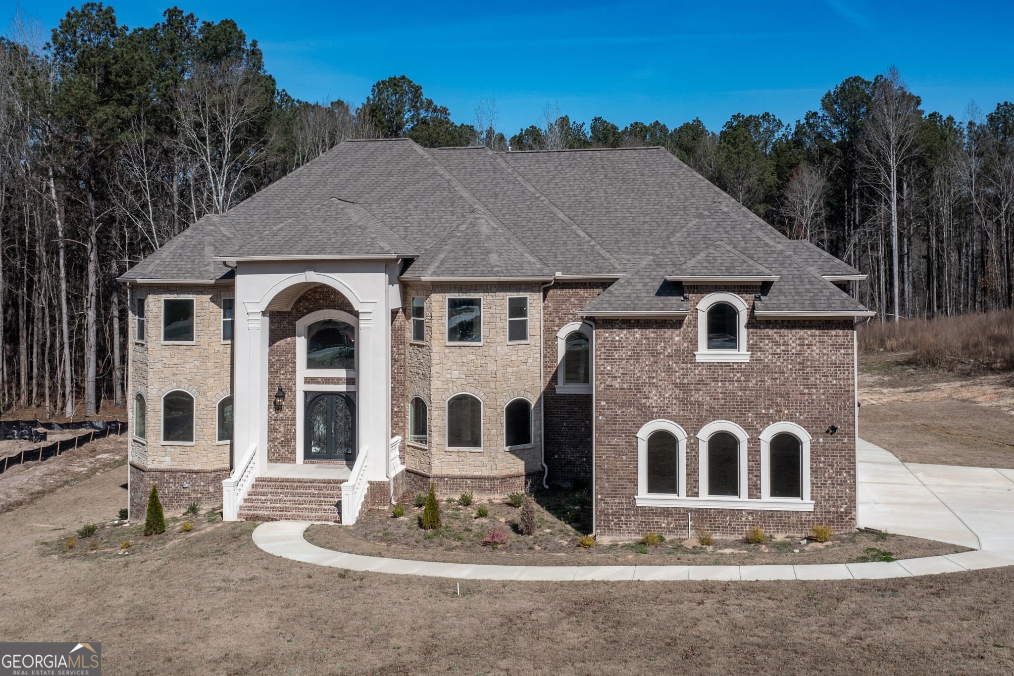 6 bedroom, 6.5 bathroom, 5,940 sq ft single family residence sold at 230 Waltham Way, Fayetteville, GA 30214