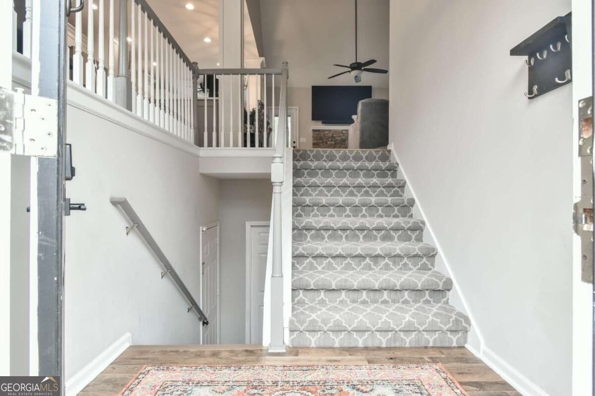 4 bedroom, 3 bathroom, 2,743 sq ft single family residence for sale at 3653 Elinburg Cove Trail, Buford, GA 30519 — photo 4