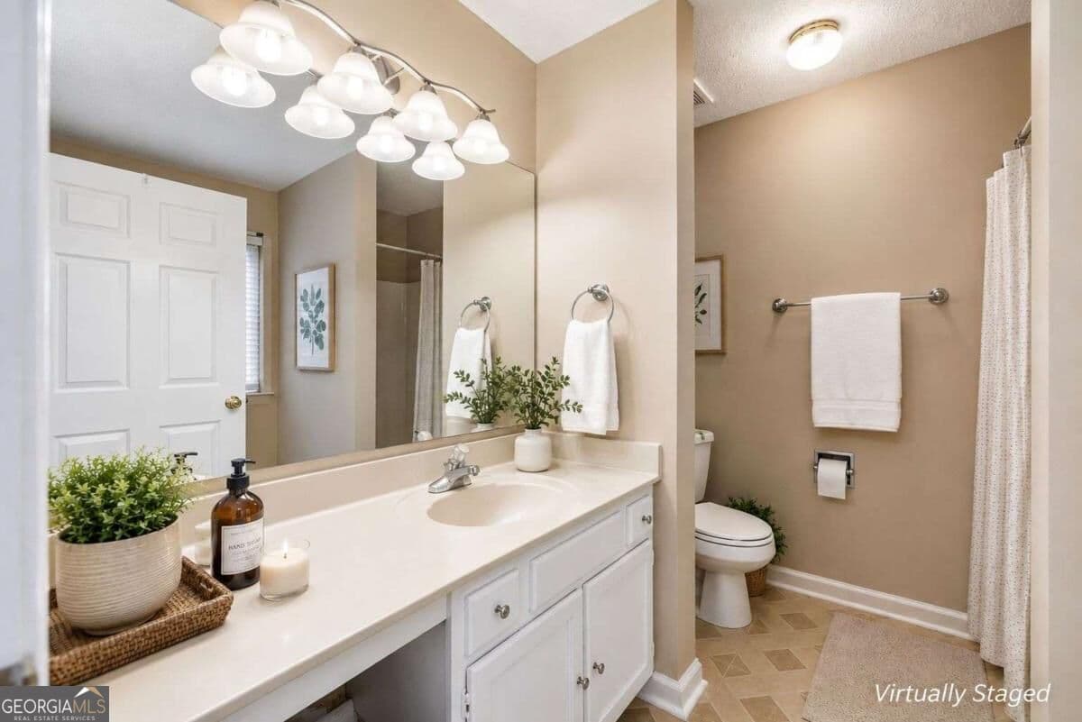 5 bedroom, 3 bathroom, 2,342 sq ft single family residence for sale at 3941 Memorial Parkway, Kennesaw, GA 30152 — photo 7