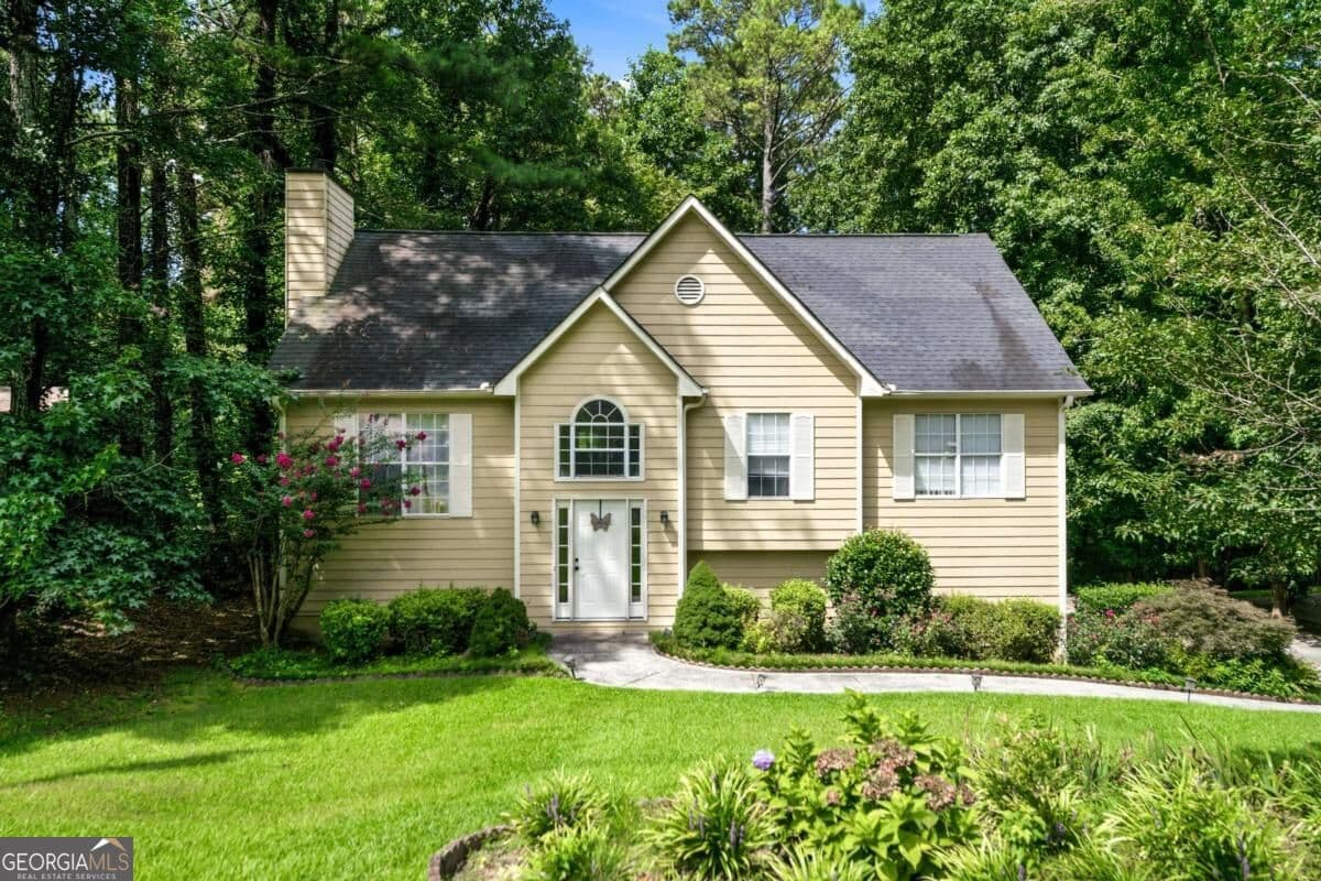 5 bedroom, 3 bathroom, 2,342 sq ft single family residence for sale at 3941 Memorial Parkway, Kennesaw, GA 30152 — photo 1 of 14