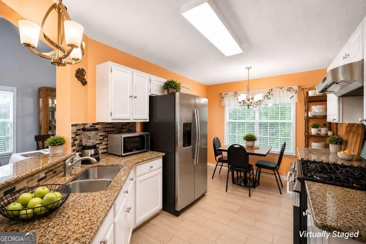 5 bedroom, 3 bathroom, 2,342 sq ft single family residence for sale at 3941 Memorial Parkway, Kennesaw, GA 30152 — photo 5