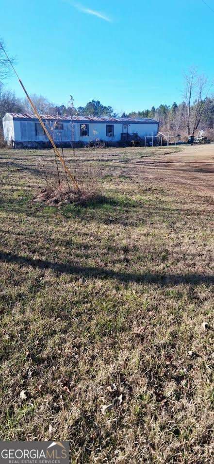 2 bedroom, 2 bathroom, 1,216 sq ft manufactured home,single family residence sold at 139 Dan Rhyne Road, Leslie, GA 31764