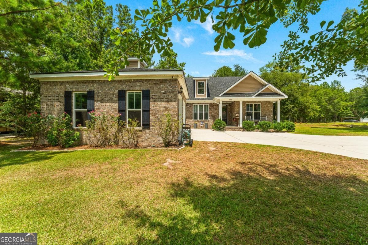 4 bedroom, 3 bathroom, 2,212 sq ft single family residence for sale at 238 Dean Drive, Guyton, GA 31312 — photo 2