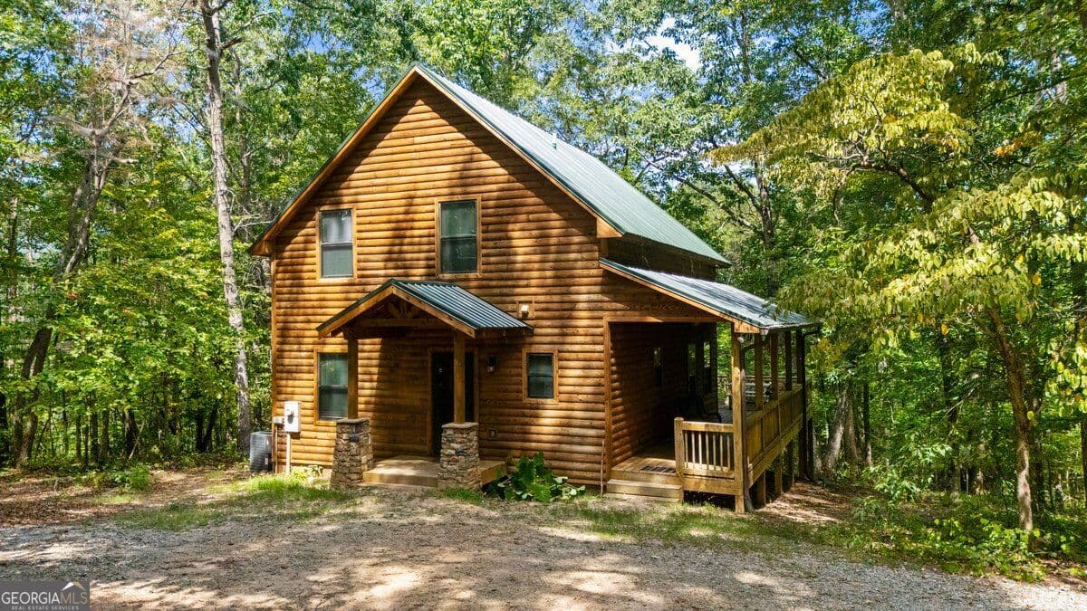 2 bedroom, 2 bathroom, 1,434 sq ft cabin,single family residence for sale at 63 Collinsbrook Trail, Cleveland, GA 30528 — photo 2