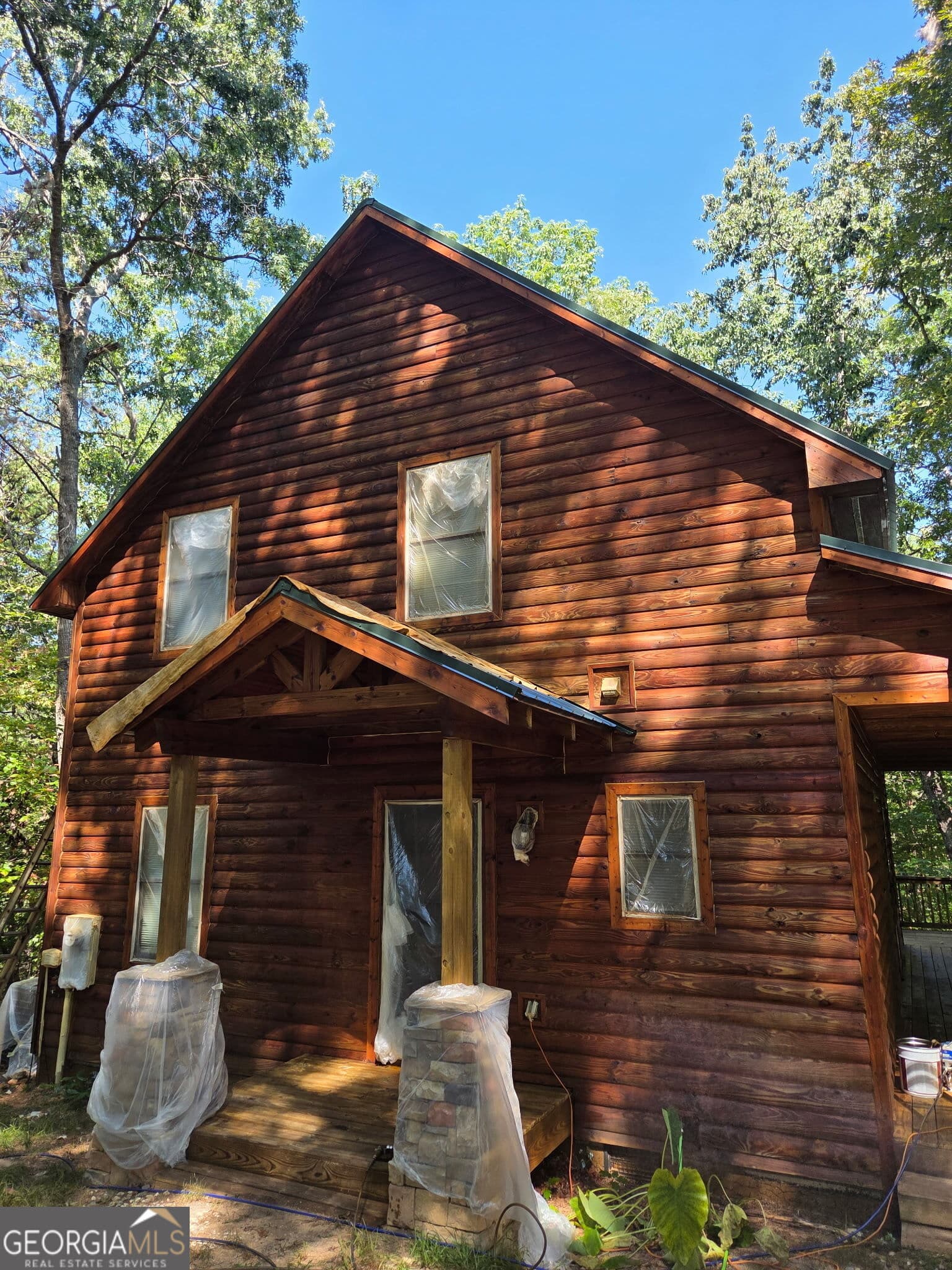 2 bedroom, 2 bathroom, 1,434 sq ft cabin,single family residence for sale at 63 Collinsbrook Trail, Cleveland, GA 30528 — photo 1 of 60
