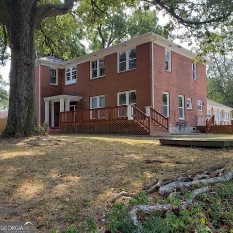 11 bedroom, 4.5 bathroom single family residence for sale at 7047 Swift Street, Lithonia, GA 30058 — photo 2