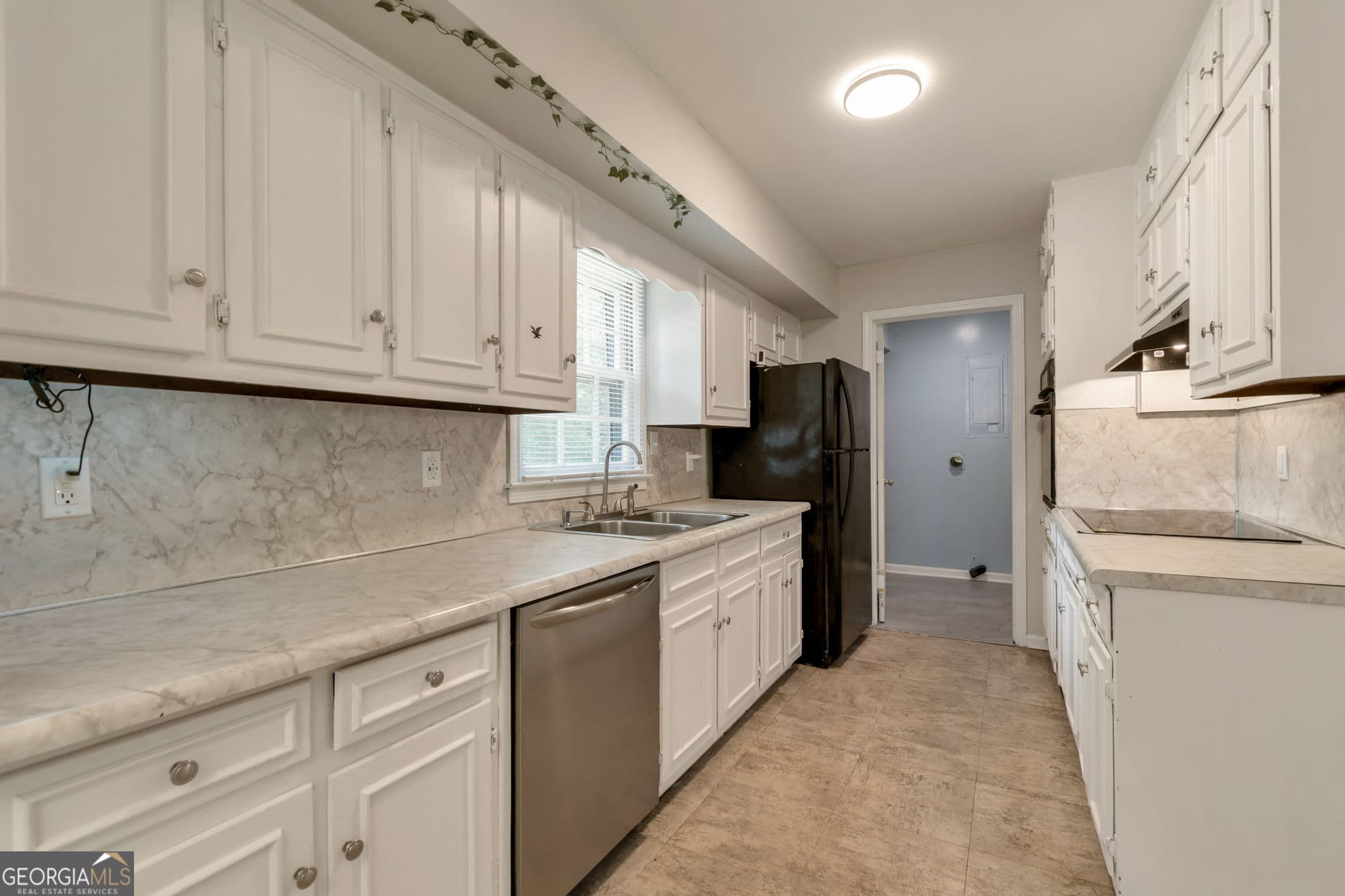 3 bedroom, 2 bathroom, 1,664 sq ft single family residence for sale at 1289 Renee Drive, Lilburn, GA 30047 — photo 10