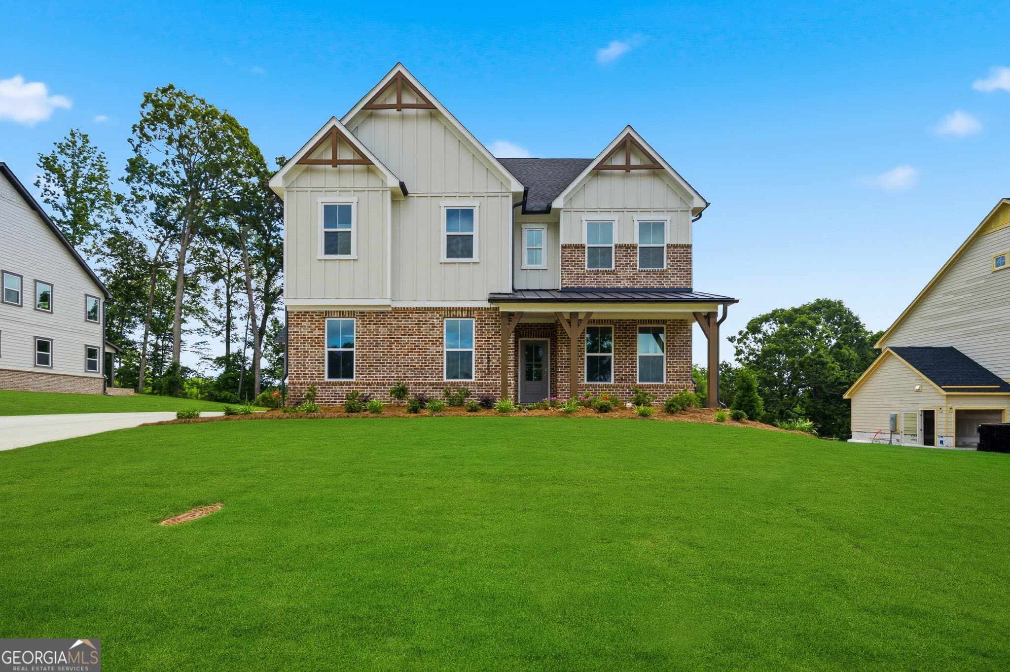 5 bedroom, 4 bathroom, 3,133 sq ft single family residence for sale at 5890 Sweet Acacia Avenue, Cumming, GA 30028 — photo 2