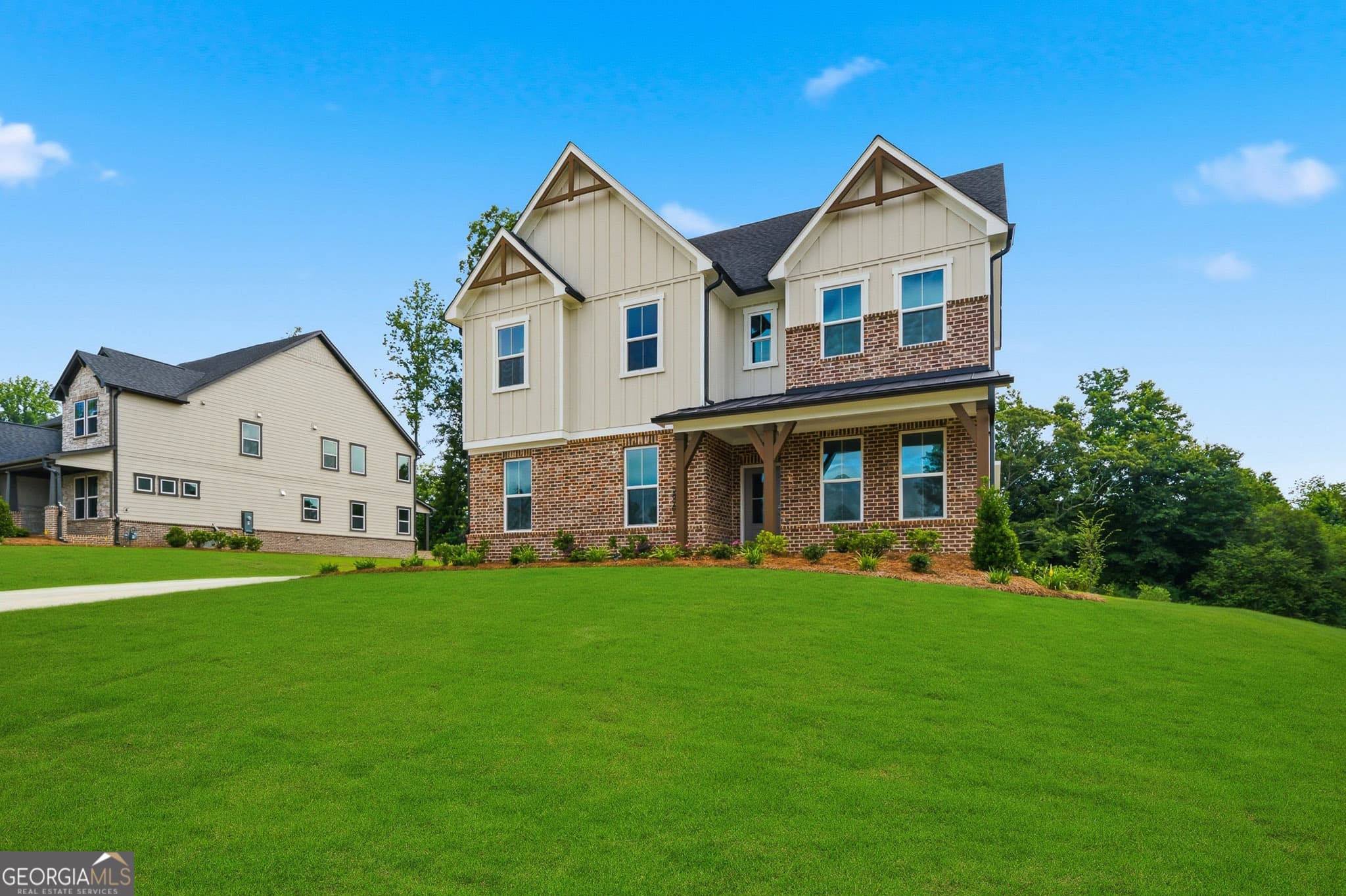 5 bedroom, 4 bathroom, 3,133 sq ft single family residence for sale at 5890 Sweet Acacia Avenue, Cumming, GA 30028 — photo 3