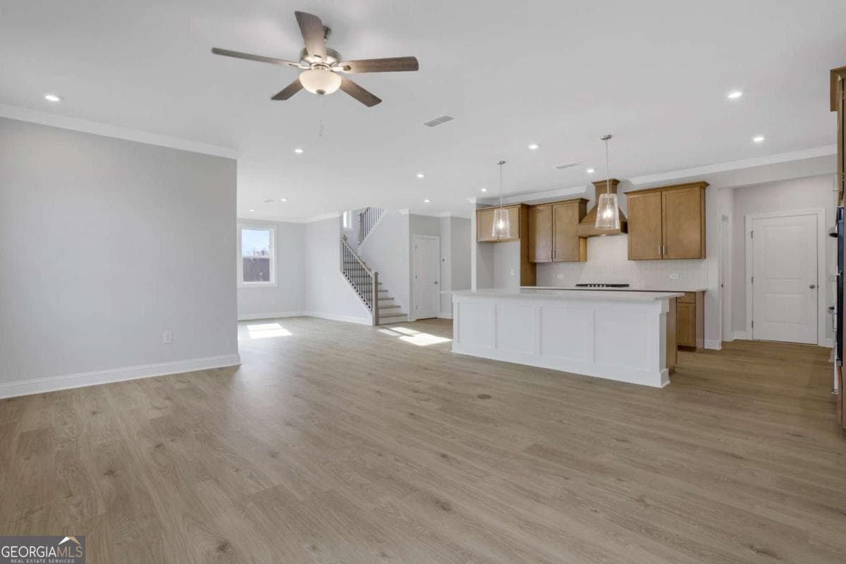 5 bedroom, 4 bathroom, 3,133 sq ft single family residence for sale at 5890 Sweet Acacia Avenue, Cumming, GA 30028 — photo 10