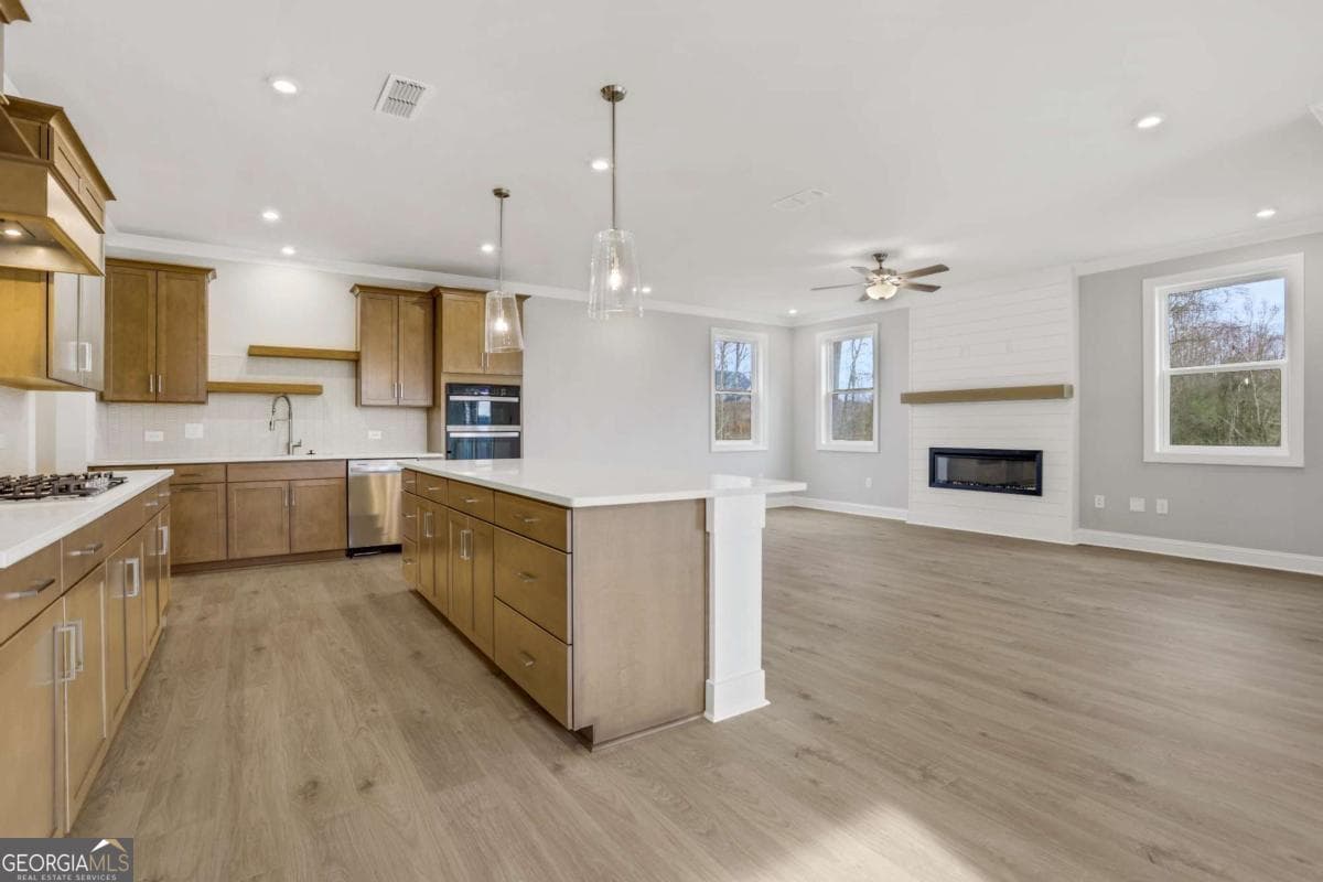 5 bedroom, 4 bathroom, 3,133 sq ft single family residence for sale at 5890 Sweet Acacia Avenue, Cumming, GA 30028 — photo 8