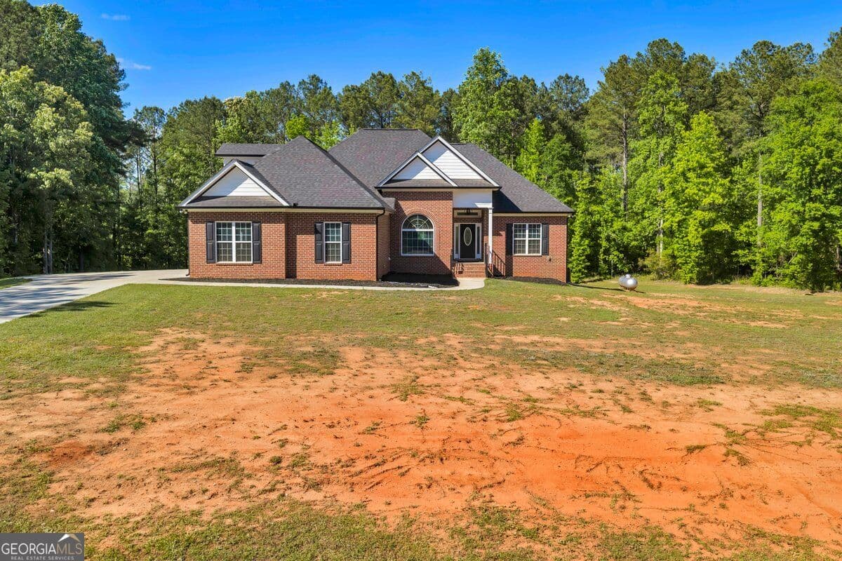 3 bedroom, 2.5 bathroom, 2,023 sq ft single family residence for sale at 2594 Lassiter Road, Forsyth, GA 31029 — photo 2