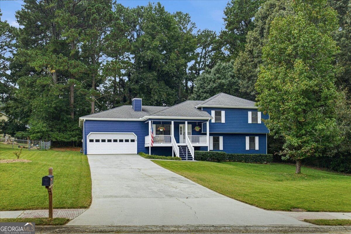 4 bedroom, 3.5 bathroom, 2,365 sq ft single family residence for sale at 1151 Rocky Road, Lawrenceville, GA 30044 — photo 2