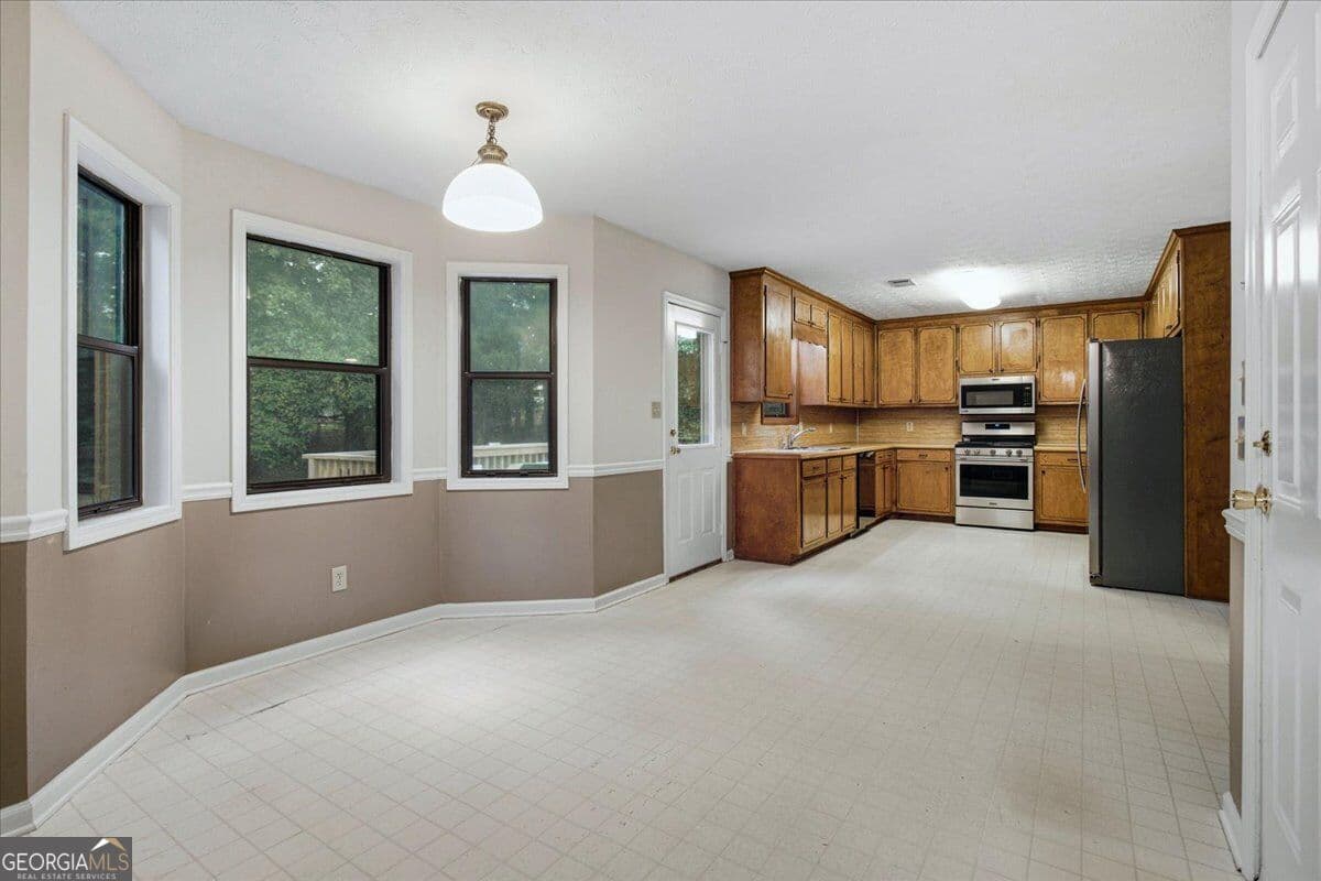 4 bedroom, 3.5 bathroom, 2,365 sq ft single family residence for sale at 1151 Rocky Road, Lawrenceville, GA 30044 — photo 10