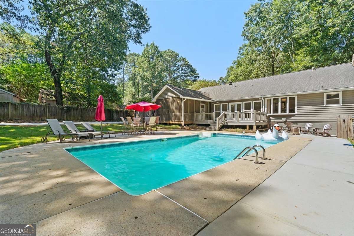 4 bedroom, 2 bathroom, 2,118 sq ft single family residence for sale at 1820 Commonwealth Avenue, Cumming, GA 30041 — photo 2