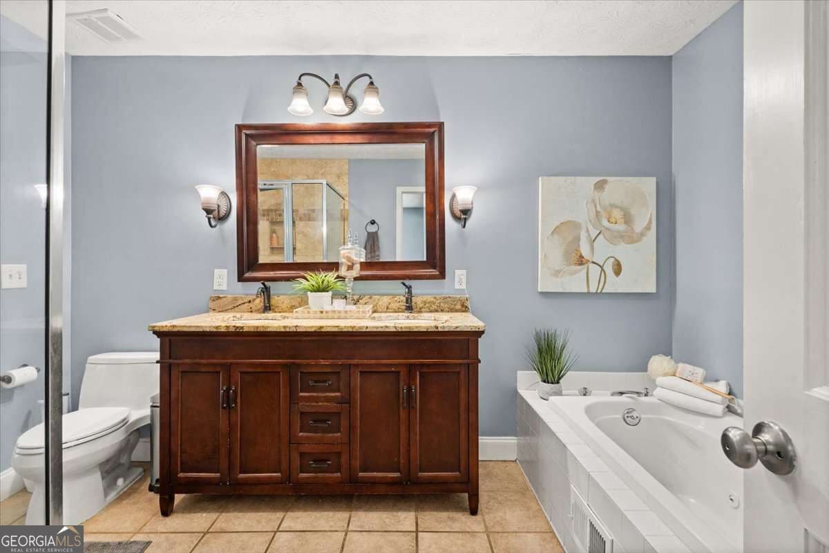 4 bedroom, 2 bathroom, 2,118 sq ft single family residence for sale at 1820 Commonwealth Avenue, Cumming, GA 30041 — photo 9