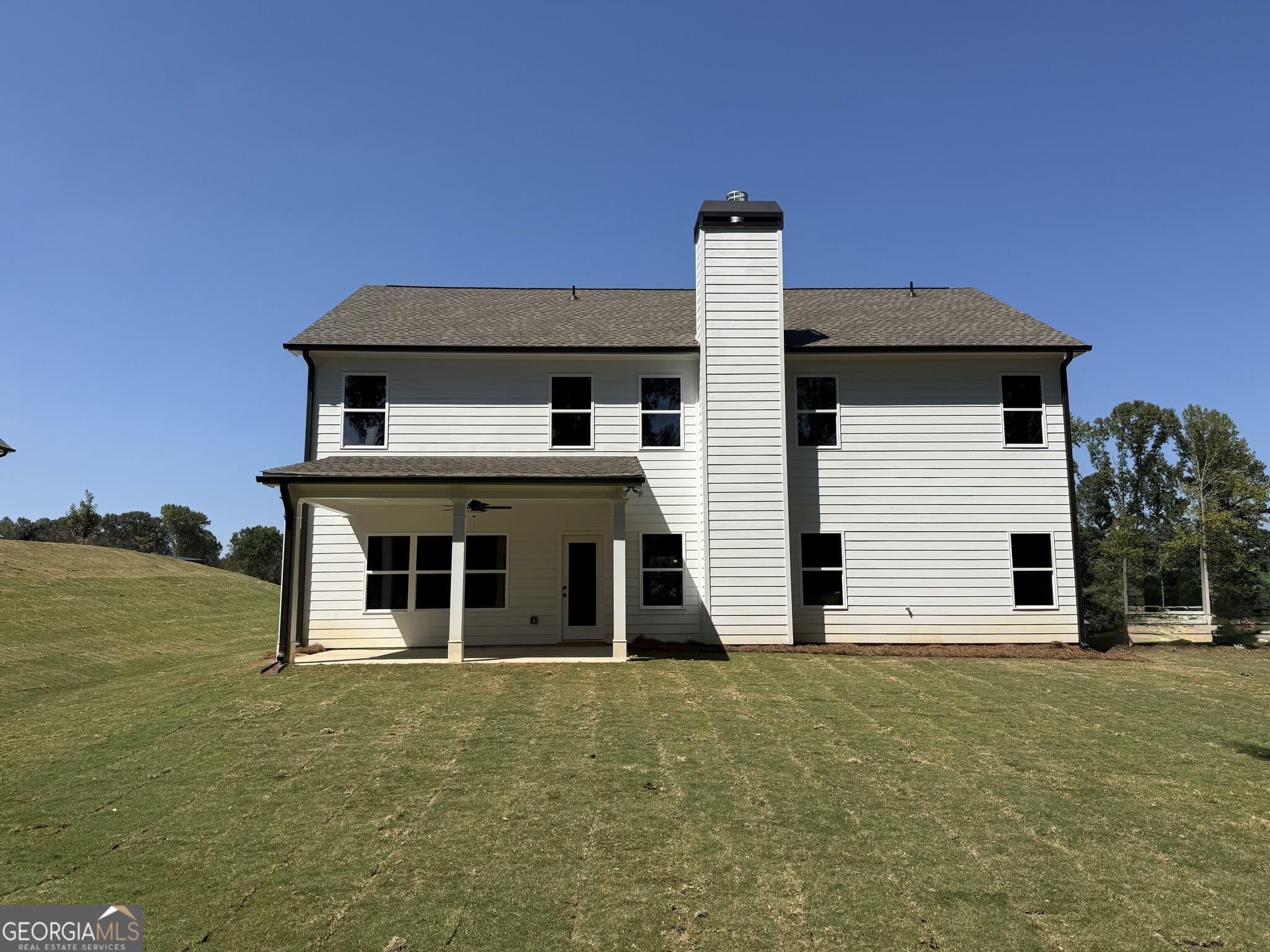 4 bedroom, 3 bathroom, 2,660 sq ft single family residence for sale at 115 FAIRWINDS Drive, Covington, GA 30016 — photo 2