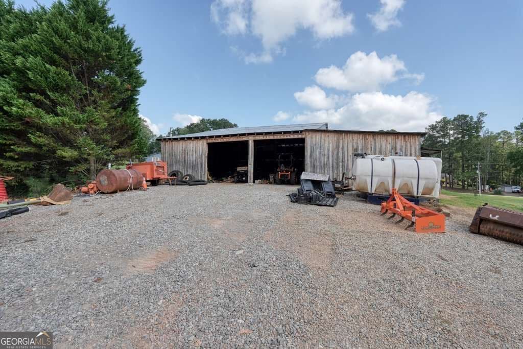 4 bedroom, 4 bathroom, 5,777 sq ft single family residence for sale at 4179 Earney Road, Woodstock, GA 30188 — photo 7