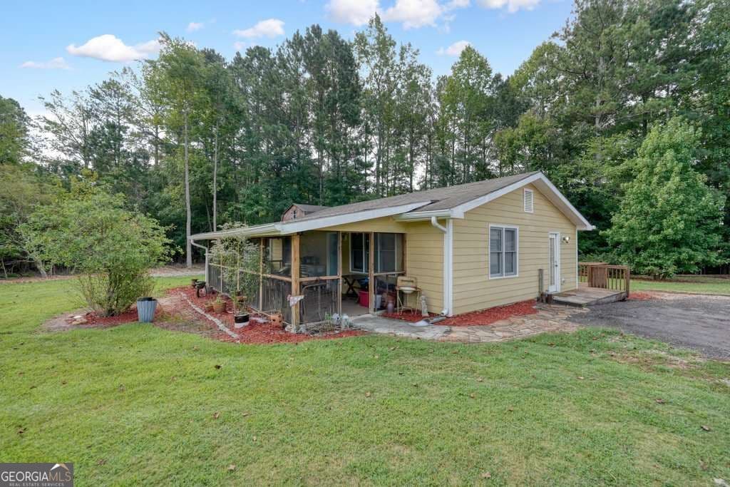 4 bedroom, 4 bathroom, 5,777 sq ft single family residence for sale at 4179 Earney Road, Woodstock, GA 30188 — photo 5