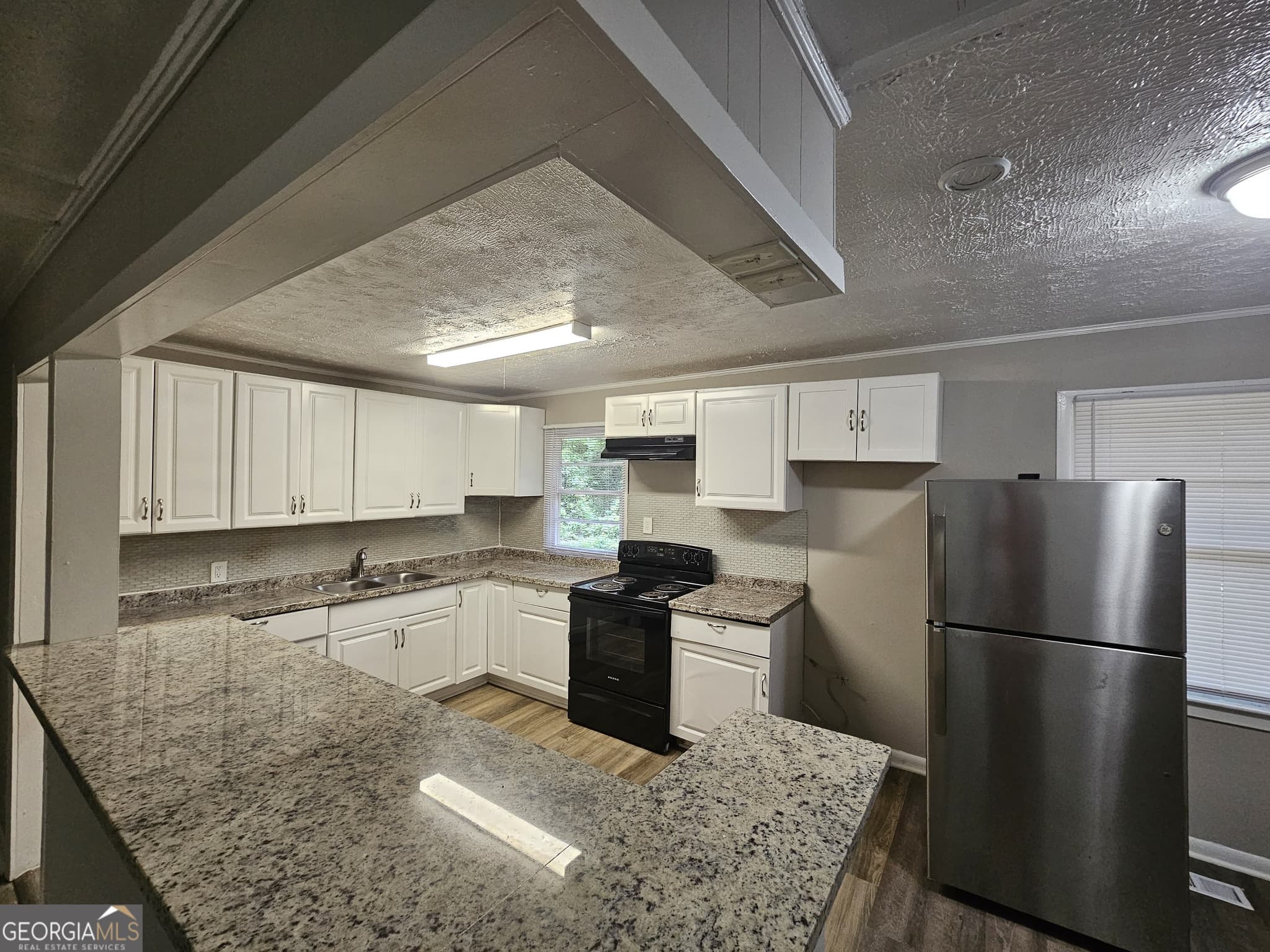 3 bedroom, 1 bathroom, 936 sq ft single family residence for sale at 3069 McKenzie Road, East Point, GA 30344 — photo 3
