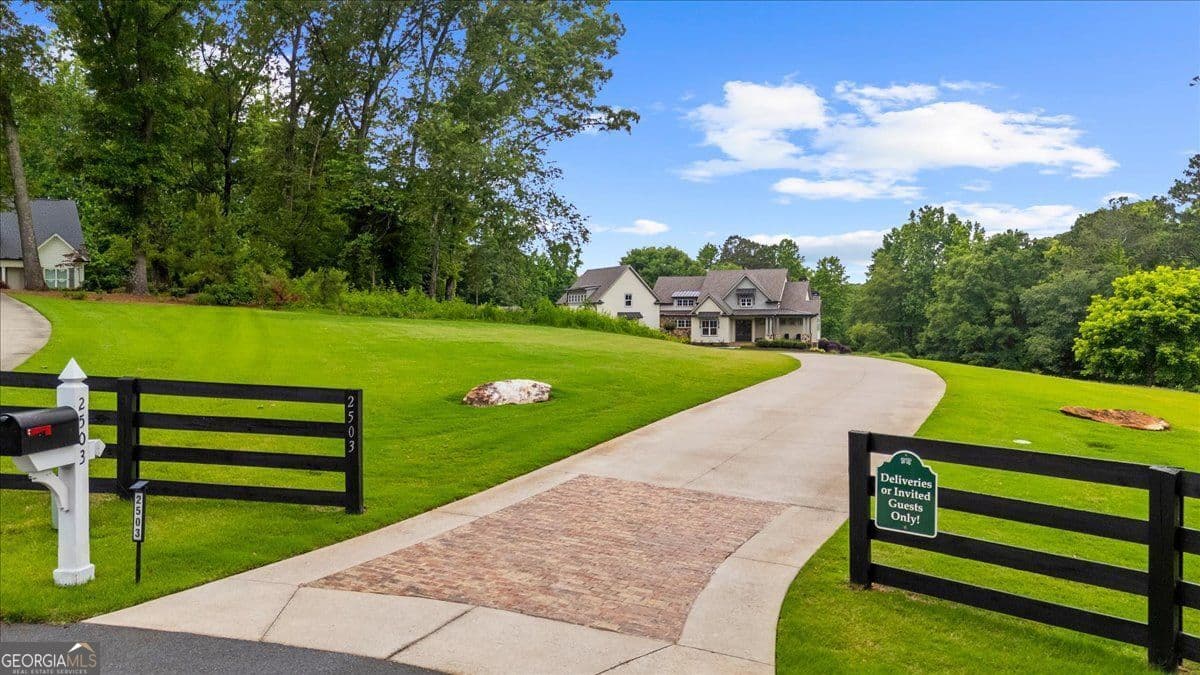 5 bedroom, 5.5 bathroom, 7,450 sq ft single family residence for sale at 2503 Sugar Pike Road, Canton, GA 30115 — photo 2