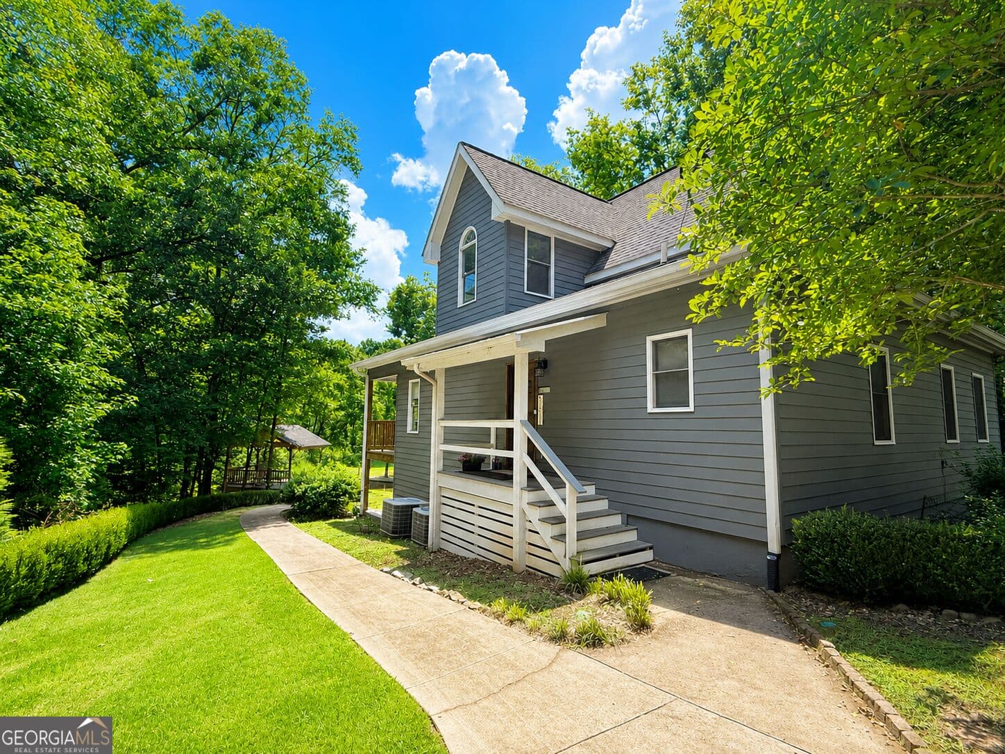 3 bedroom, 3 bathroom, 3,294 sq ft single family residence for sale at 1070 Apalachee Woods Trail, Buckhead, GA 30625 — photo 2