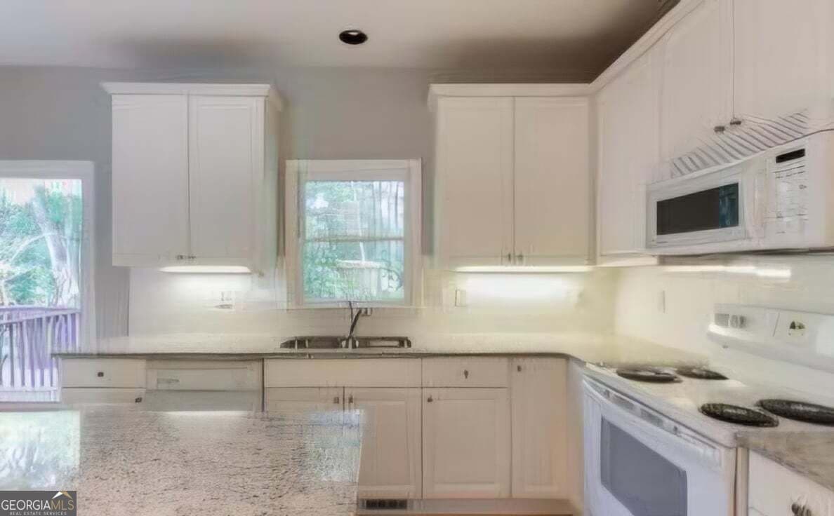 4 bedroom, 2.5 bathroom, 3,350 sq ft single family residence for sale at 1714 Lake Heights Circle, Dacula, GA 30019 — photo 6