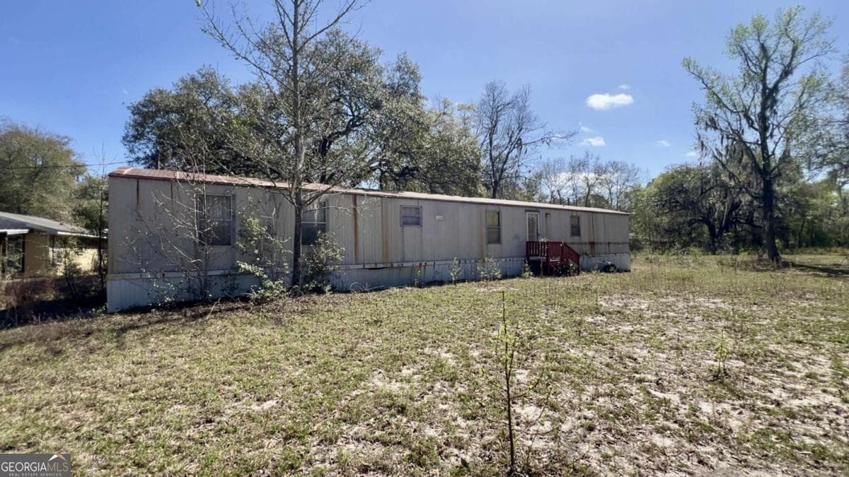3 bedroom, 2 bathroom, 1,064 sq ft single family residence under contract at 265 Big Cypress Drive, Bloomingdale, GA 31302
