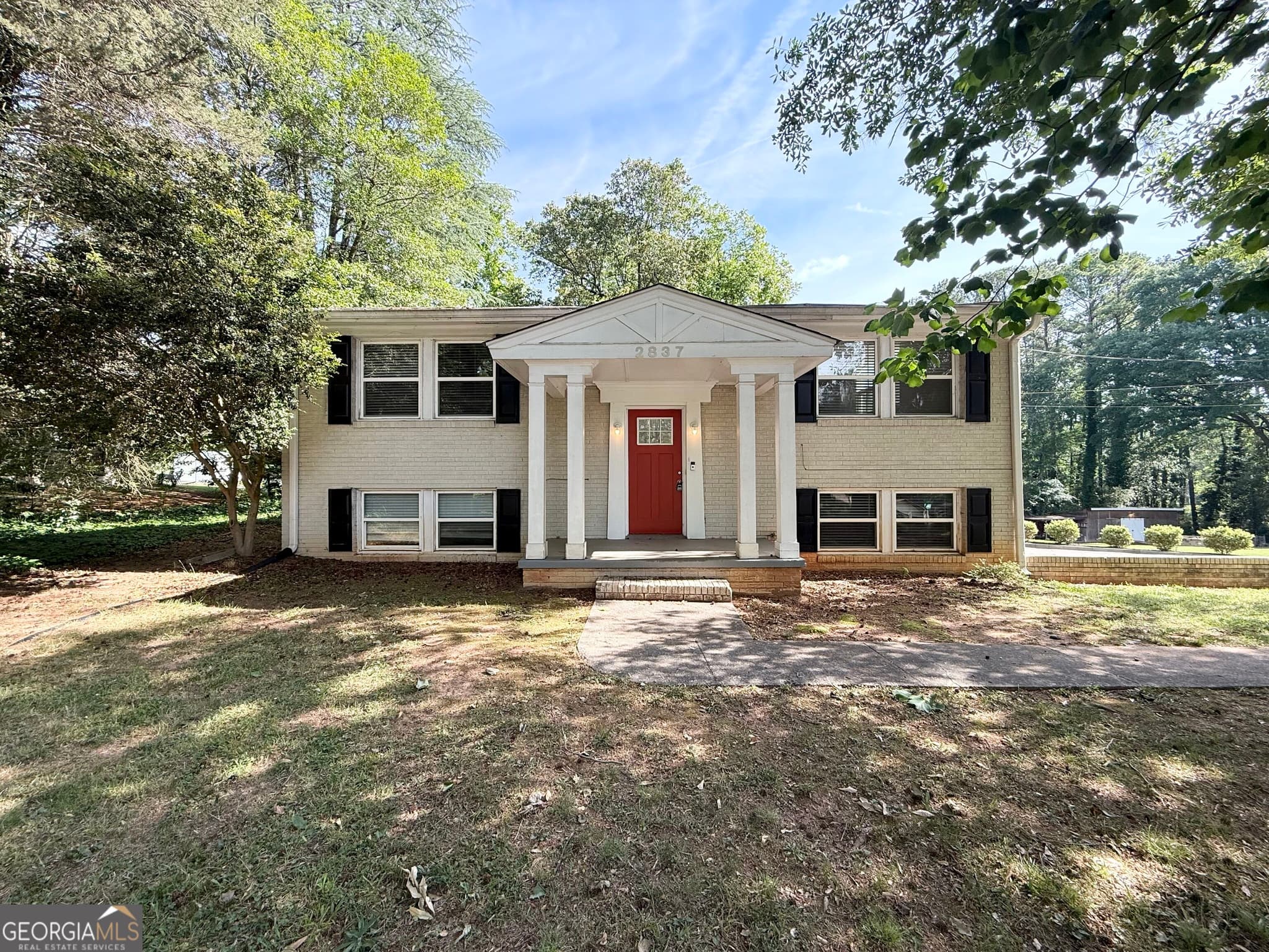 5 bedroom, 2 bathroom, 3,202 sq ft single family residence for sale at 2837 Redwine Road, East Point, GA 30344 — photo 2