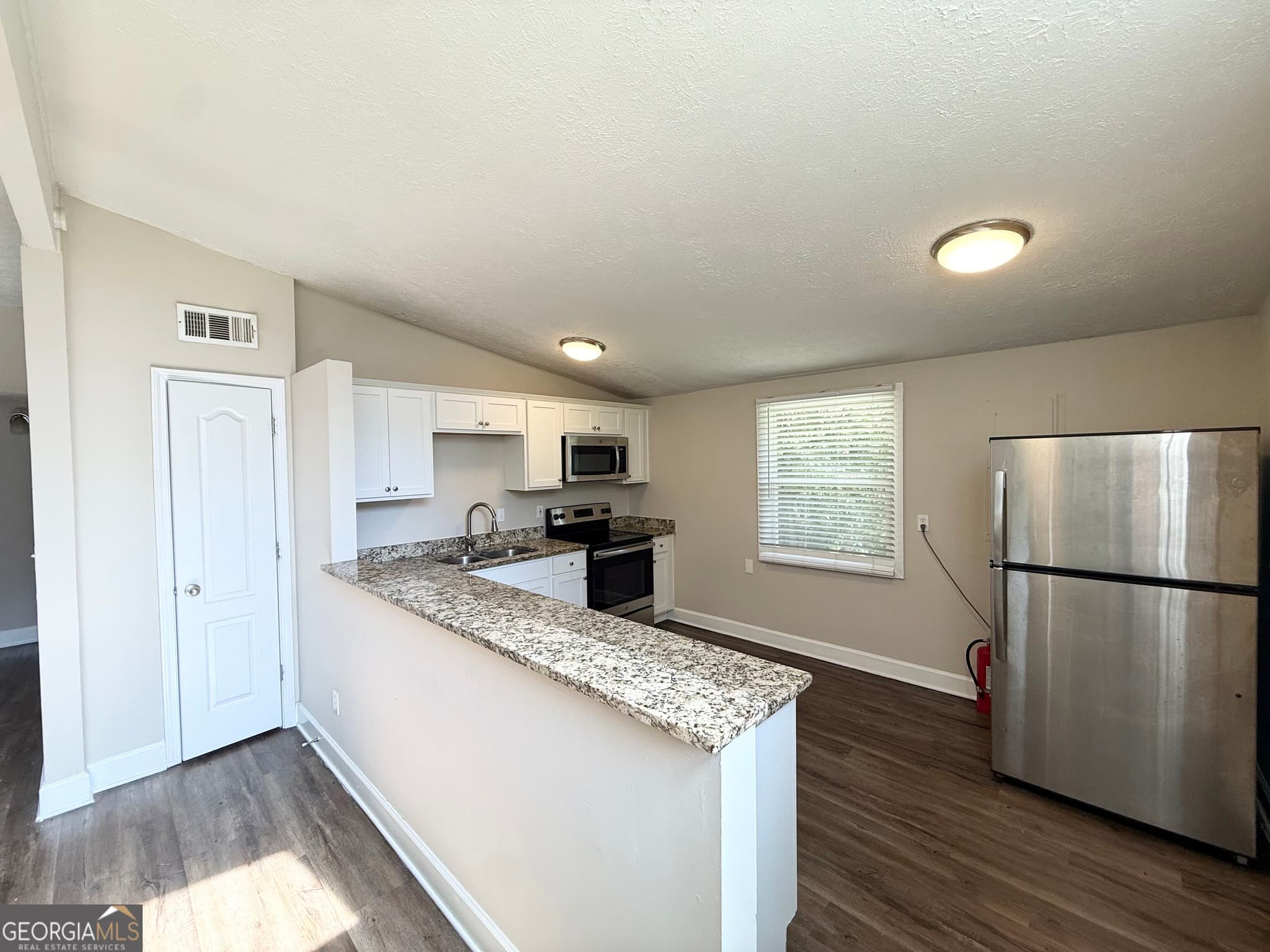 5 bedroom, 2 bathroom, 3,202 sq ft single family residence for sale at 2837 Redwine Road, East Point, GA 30344 — photo 4