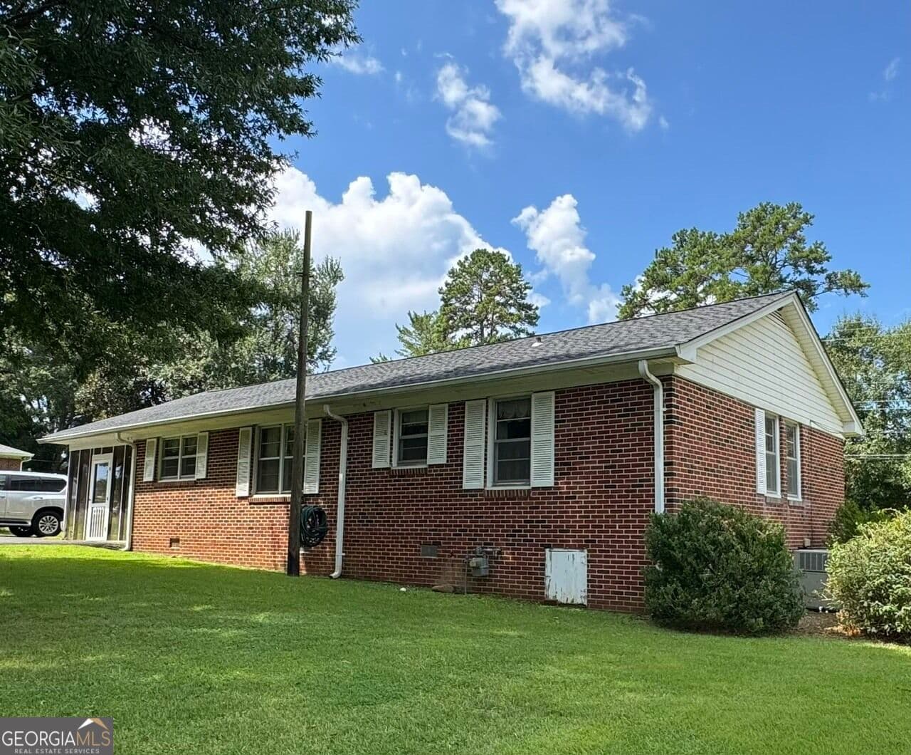 3 bedroom, 1.5 bathroom, 1,313 sq ft single family residence for sale at 296 Goodwin Drive, Summerville, GA 30747 — photo 2