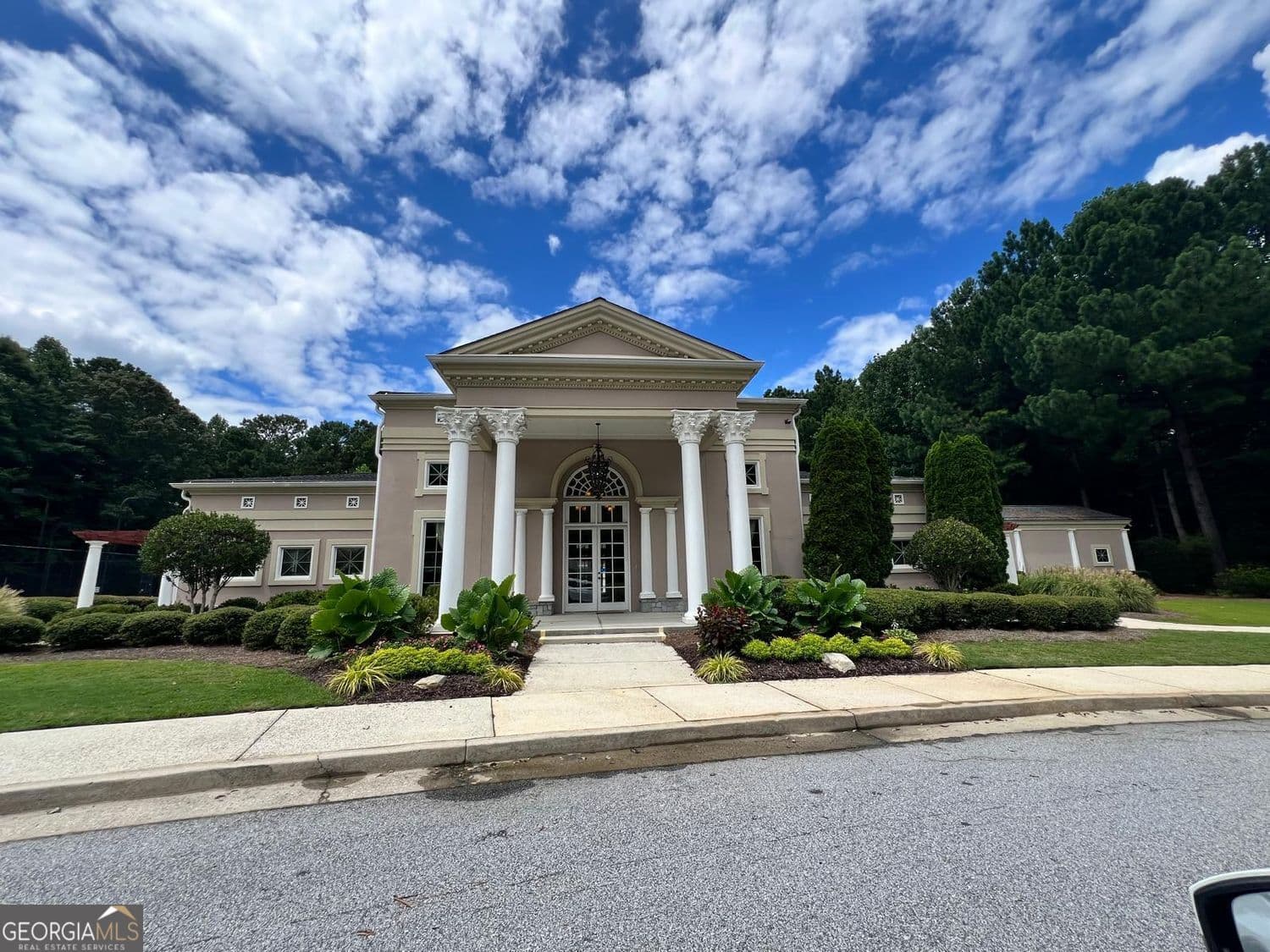 4 bedroom, 2 bathroom, 5,702 sq ft single family residence for sale at 5441 The Vyne Avenue, Atlanta, GA 30349 — photo 2