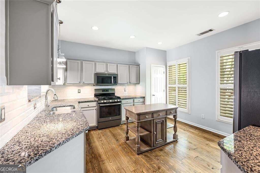 4 bedroom, 3.5 bathroom, 2,665 sq ft townhouse for sale at 352 Suwanee Avenue, Suwanee, GA 30024 — photo 5