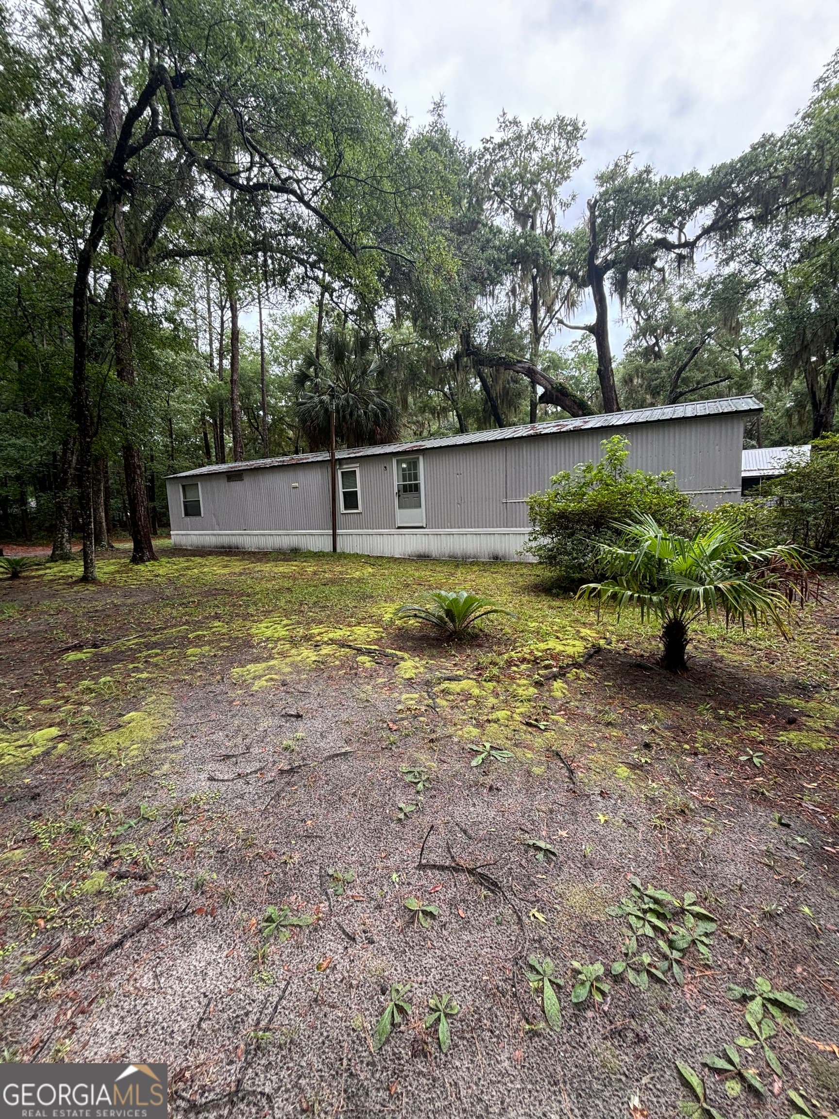 3 bedroom, 2 bathroom, 864 sq ft manufactured home,single family residence for sale at 1081 Caton Road, Townsend, GA 31331 — photo 3
