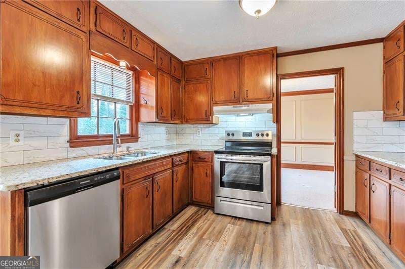 6 bedroom, 3.5 bathroom, 3,010 sq ft single family residence for sale at 1306 Arlene Court, Lilburn, GA 30047 — photo 6
