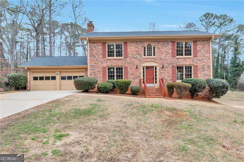 6 bedroom, 3.5 bathroom, 3,010 sq ft single family residence for sale at 1306 Arlene Court, Lilburn, GA 30047 — photo 1 of 26