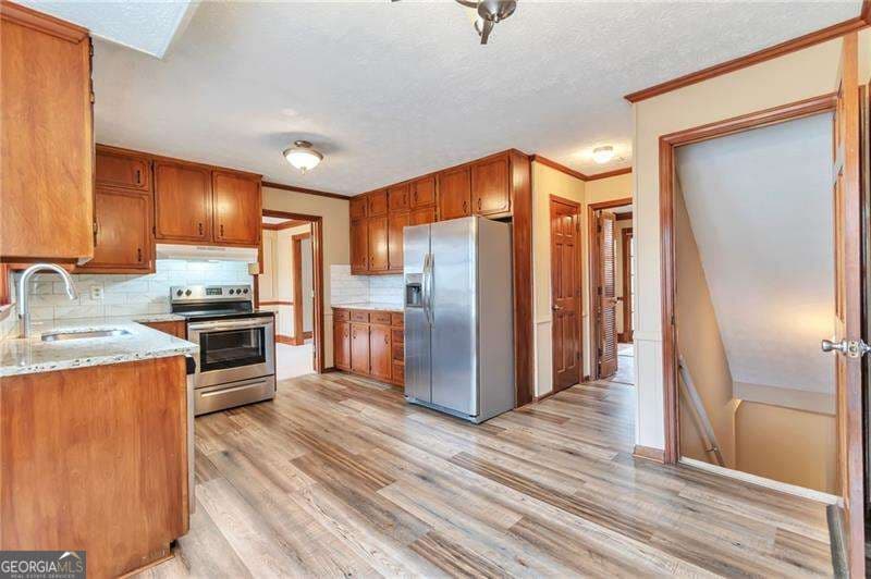 6 bedroom, 3.5 bathroom, 3,010 sq ft single family residence for sale at 1306 Arlene Court, Lilburn, GA 30047 — photo 8