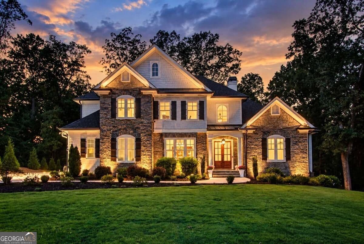 5 bedroom, 4.5 bathroom, 4,742 sq ft single family residence for sale at 5392 Retreat Drive, Flowery Branch, GA 30542 — photo 2