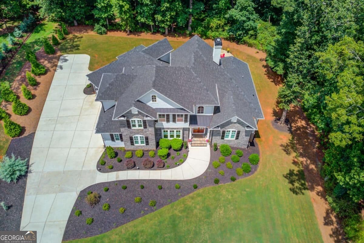 5 bedroom, 4.5 bathroom, 4,742 sq ft single family residence for sale at 5392 Retreat Drive, Flowery Branch, GA 30542 — photo 7