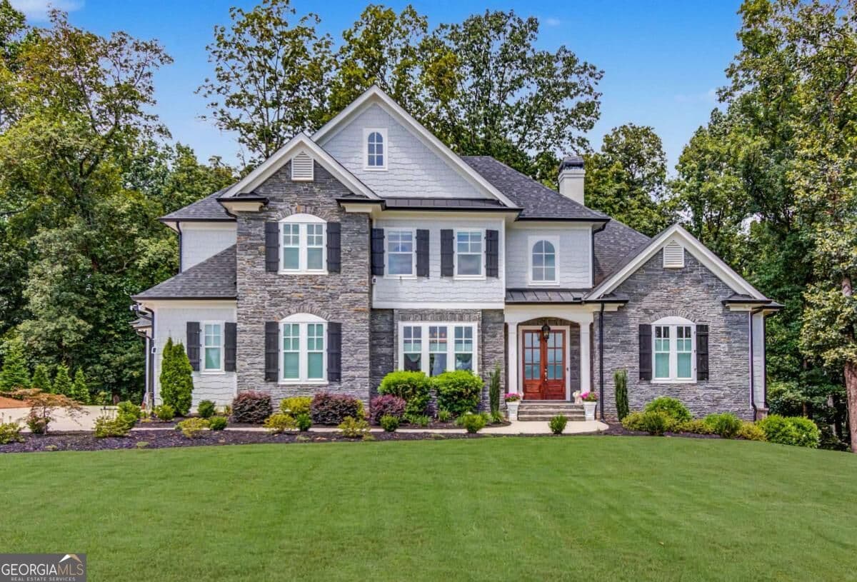 5 bedroom, 4.5 bathroom, 4,742 sq ft single family residence for sale at 5392 Retreat Drive, Flowery Branch, GA 30542 — photo 1 of 91