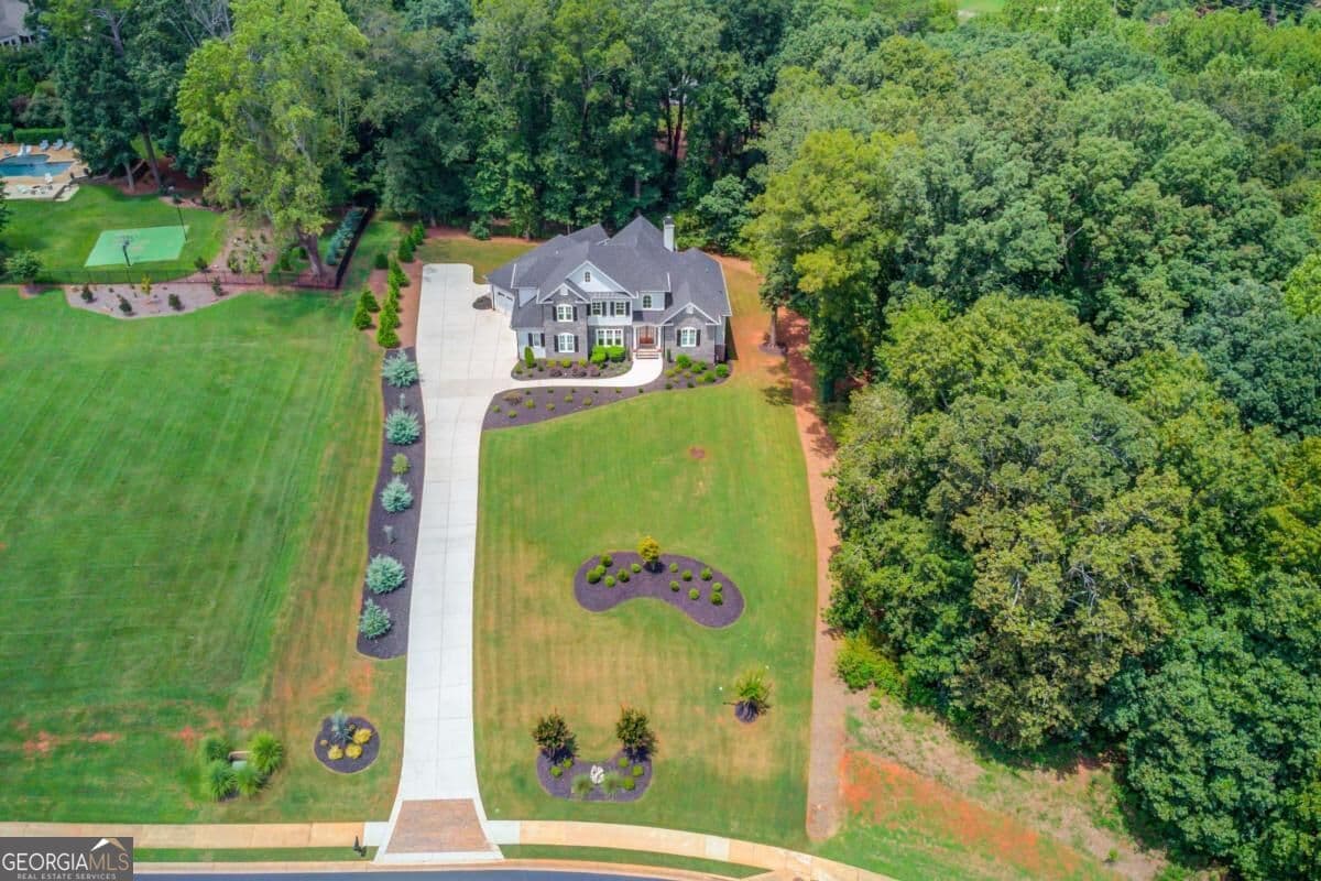 5 bedroom, 4.5 bathroom, 4,742 sq ft single family residence for sale at 5392 Retreat Drive, Flowery Branch, GA 30542 — photo 5