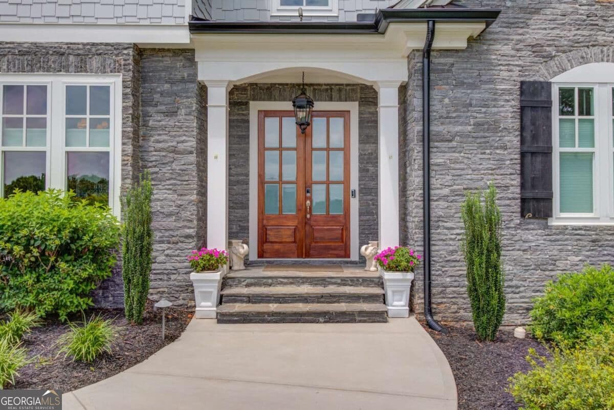 5 bedroom, 4.5 bathroom, 4,742 sq ft single family residence for sale at 5392 Retreat Drive, Flowery Branch, GA 30542 — photo 9